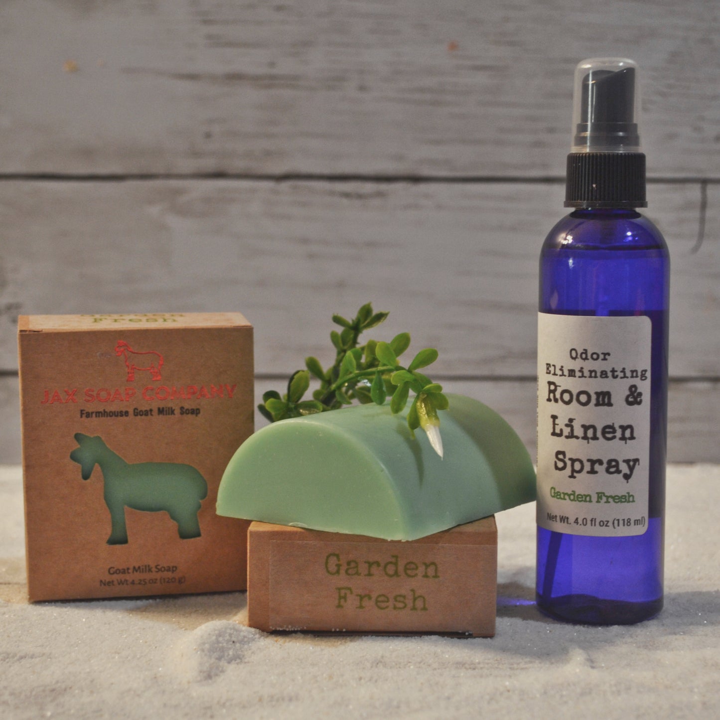 bar of soap and bar of soap in box, bottle of room spray
